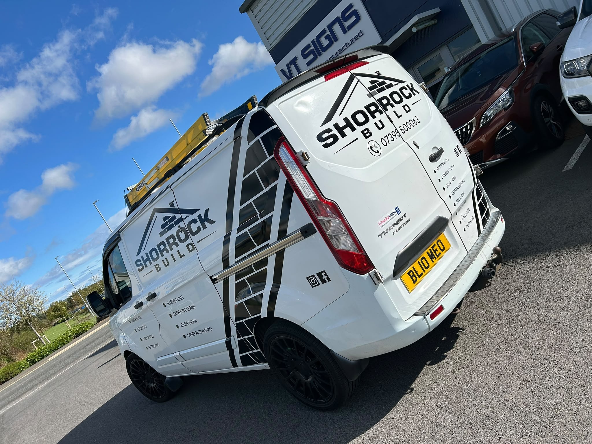 VT Signs branded vehicle livery — white van with full company graphics